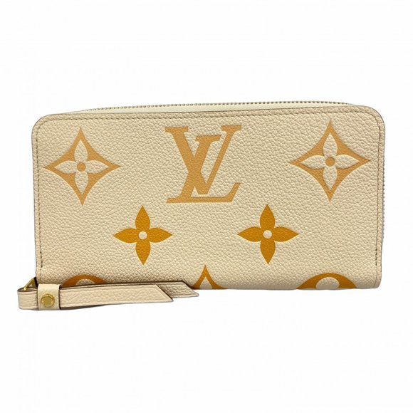 LOUIS VUITTON Cream Monogram Wallet - Picture 1 of 6